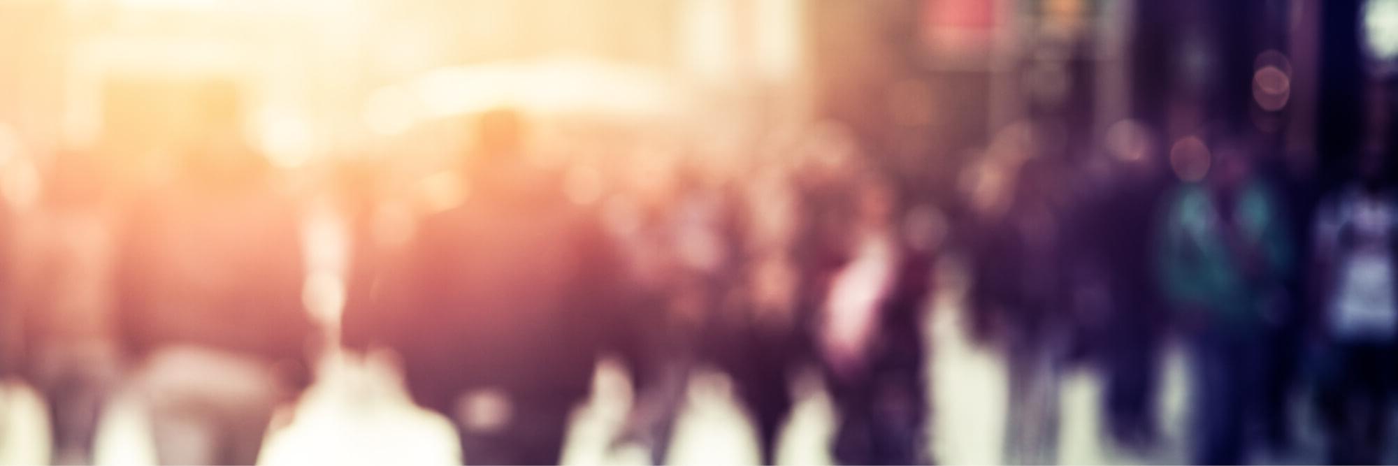 Crowd of people at sunset